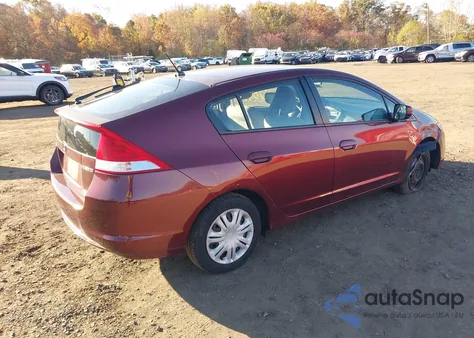 2011 Honda Insight from USA, damaged, VIN JHMZE2H38BS007335